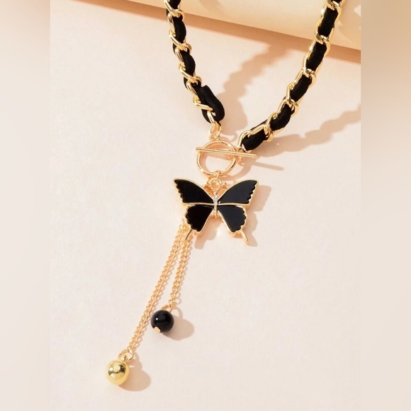 Elegant Gold and Black Butterfly Charm Necklace - Picture 3 of 4